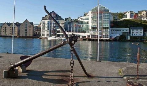 Anchor on a pier in the inner harbour of Ålesund