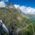 The Troll Road with its hairpin bends and the Stigfossen waterfall outside Åndalsnes, Norway