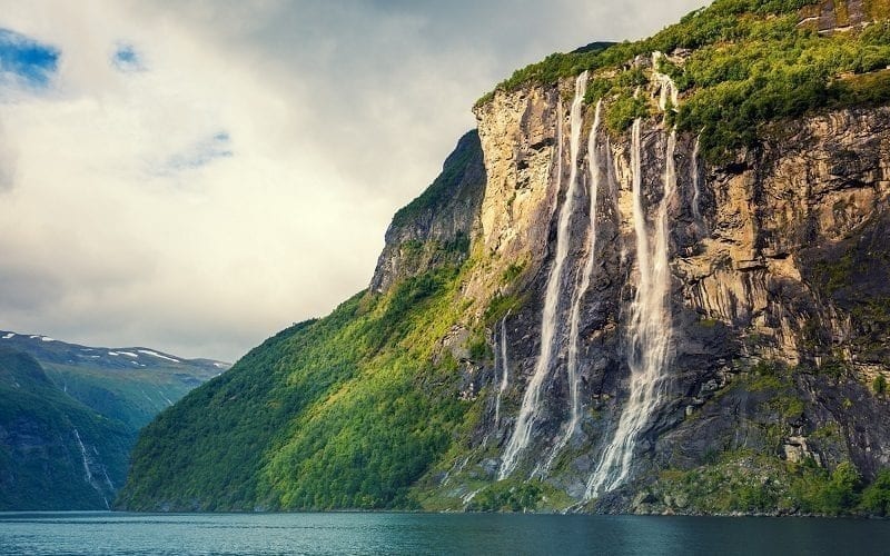 The Seven Sisters waterfalls flowing into the Geirangerfjord