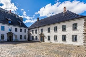 Interior courtyard look at some building that make up the Bergenhus fortress in Bergen