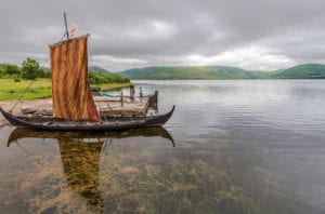 Reconstructed Viking ships in the lake at Vestvagoy. The area is a part of Lofotr Viking museum.