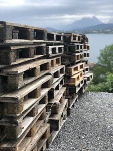 Pallets stacked up in preparation to build the Slinningsbålet bonfire.